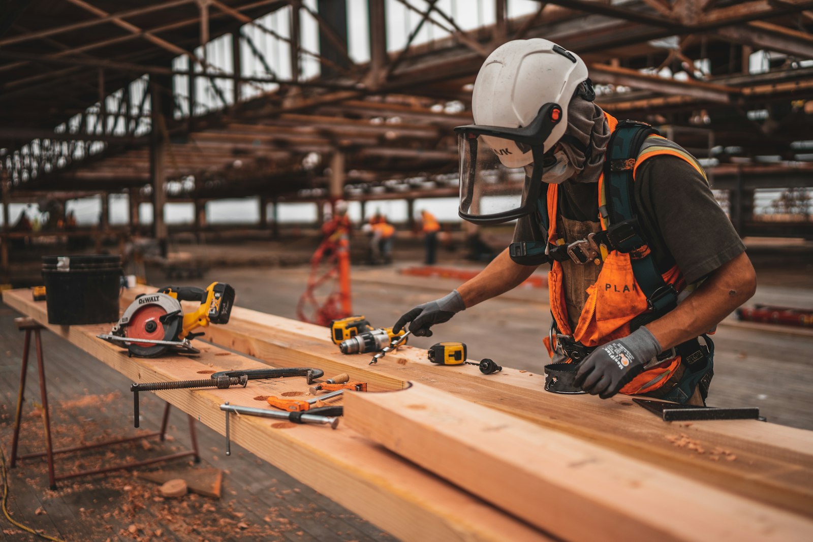 Bricklayer laying bricks with a trowel